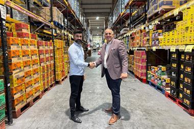 Enzo Wholesale MD Umit Aydemir (pictured left) with Unitas member development controller Stephen Cheetham