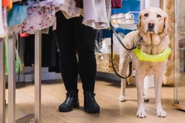 Guide dog owner shopping