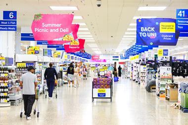 tesco store aisle shoppers