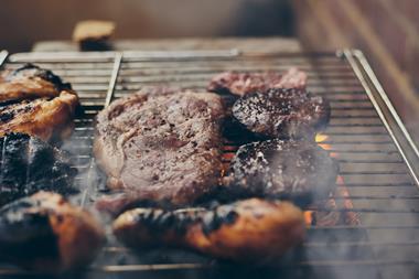 meat on a bbq - getty