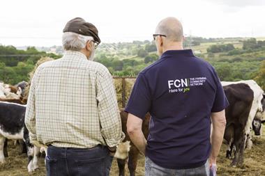 FCN farmers looking at cows GRABS-3