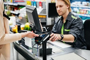 Supermarket checkout payment price till GettyImages-1141999547