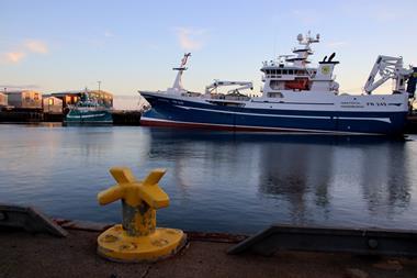 Fraserburgh, Aberdeenshire, Scotland - November 1, 2025: Trawlers moored in Fraserburgh harbour at dusk