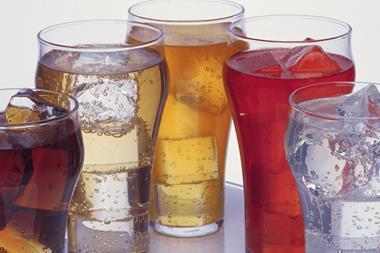focus on soft drinks, glasses of drink and ice