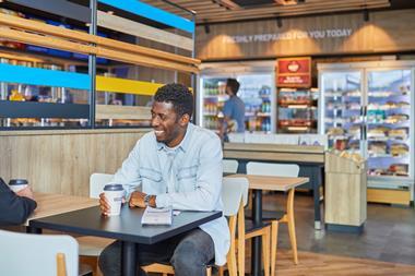 Greggs - Customers enjoy drinks and food at a Greggs outlet in Dunstable  2100x1400