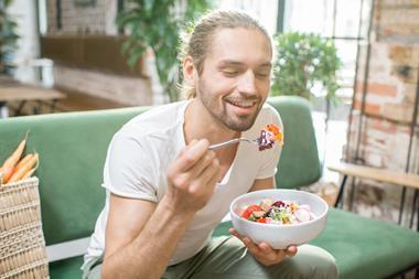man eating vegan vegetarian salad food