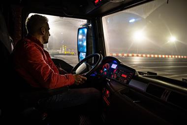 Lorry driver at night