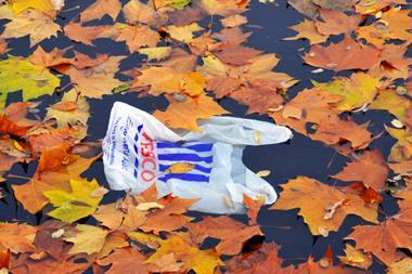 tesco carrier bag on ground one use