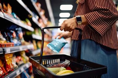 woman filling shopping basket