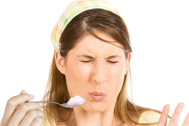 Focus on Yoghurt, woman eating sour yoghurt