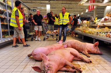 pig in supermarket protest one use