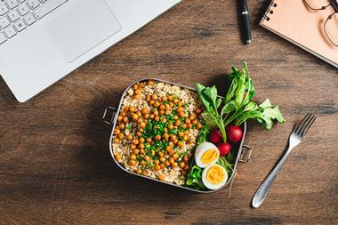 Healthy lunch box office desk GettyImages-1321195571