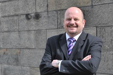 Portrait of free-range chickens at ground level - Getty Images