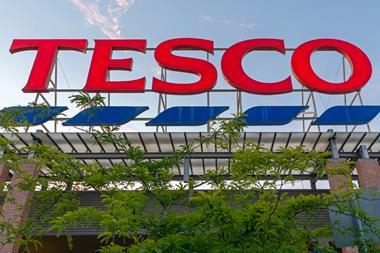tesco store sign tree GettyImages-1426886264