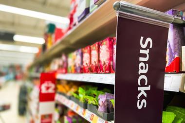 snack aisle supermarket hfss GettyImages-1430384008