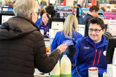tesco store checkout clubcard pay customer worker (5)