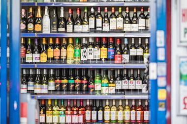 supermarket wine alcohol aisle shelf GettyImages-1305261341