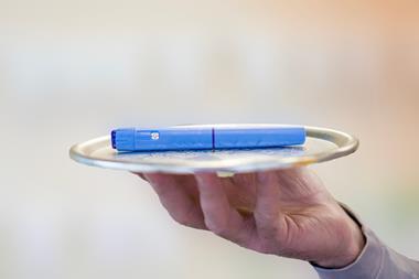 Ozempic medication on silver tray - Getty