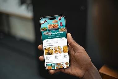 Free Hand Holding iPhone 16 Pro Mockup