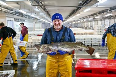 Cod fishing boat skipper David Milne in Peterhead fish market