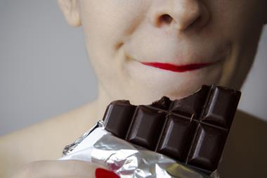 woman eating chocolate