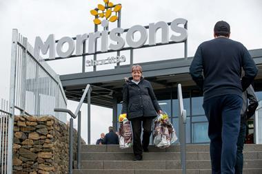Morrisons grows sales but still loses nearly £1bn