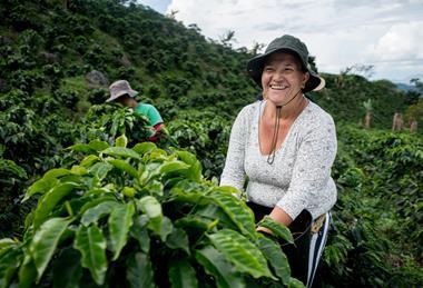 Woman working at Colombian coffee farm - getty