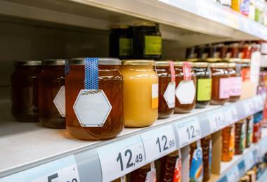 honey bottles supermarket shelf
