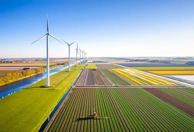 farming farm wind turbine sustainable sustainability eco climate change GettyImages-1396844586