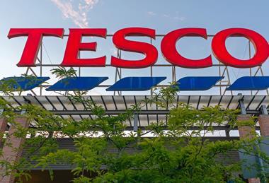 tesco store sign tree GettyImages-1426886264