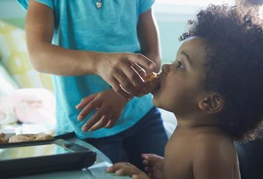 child eating sugar