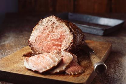 sirloin beef on chopping board- getty