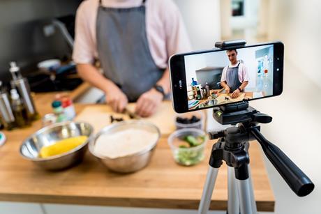 Social media influencer filming GettyImages-2160980929