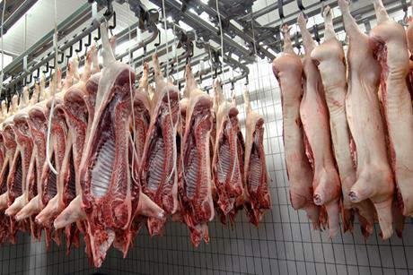 Meat hanging in abattoir