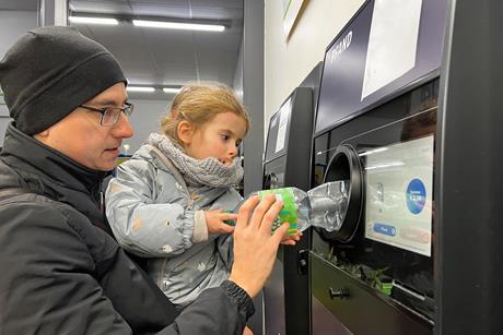 drs deposit return scheme bottle recycling plastic machine GettyImages-1469751090