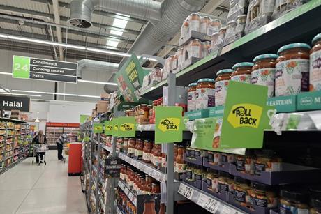 Asda losses reach nearly £1bn
