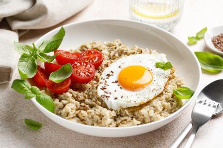 Savoury breakfast oatmeal porridge egg GettyImages-2043604340