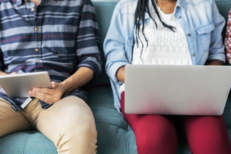 Young people working with a laptop