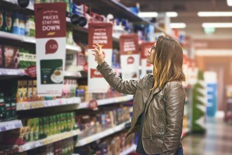 woman looking at shelves- Getty