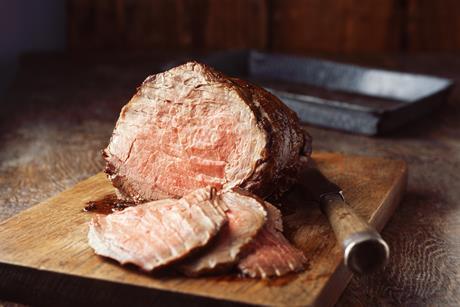 sirloin beef on chopping board- getty