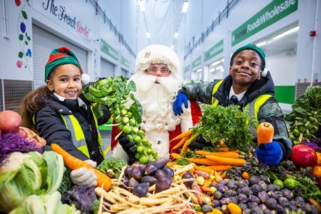 Father Christmas visits New Covent Garden Market, with Ana Julia and Nathan, both aged 7 - NCGM