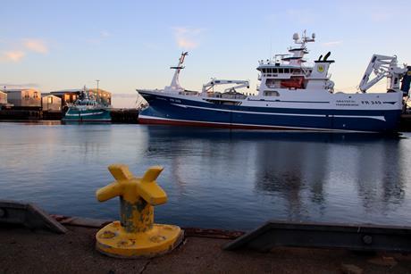 Fraserburgh, Aberdeenshire, Scotland - November 1, 2025: Trawlers moored in Fraserburgh harbour at dusk