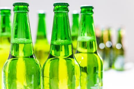 Green beer bottle GettyImages-1312825752