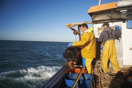 fisherman on a boat - getty