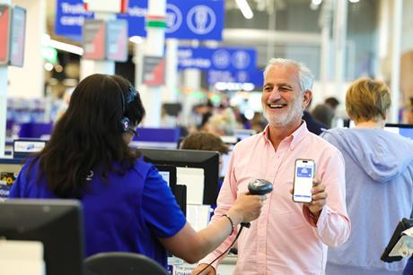 tesco store checkout clubcard pay customer worker (3)