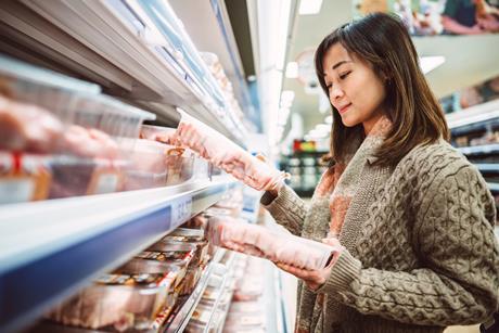 supermarket shopper chicken meat poultry compare aisle