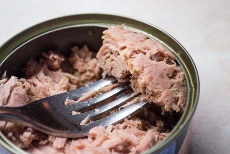 Tunafish in a Can With a Fork - stock photo