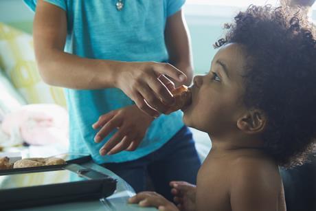 child eating sugar
