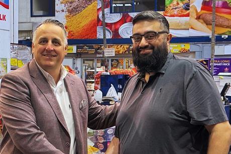 Unitas member development controller Stephen Cheetham (left) with Giro Foods purchasing manager Usmaan Akram (right)