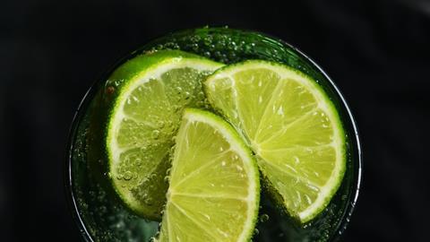 Lime slices in drinking glasses
